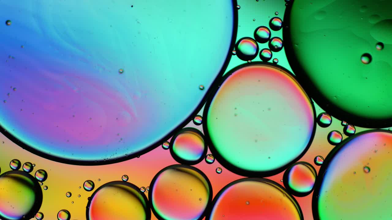 Colorful artistic of oil drop floating on the water. Abstract bubble backgrou