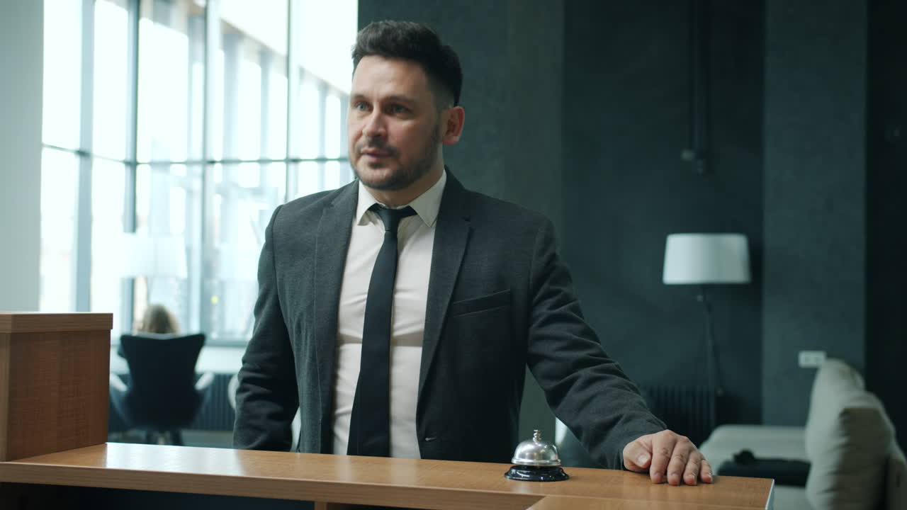 Hotel Receptionist Welcoming Guests