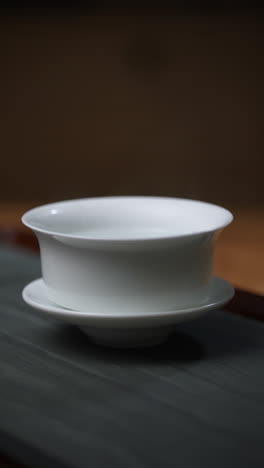 white porcelain tea cup