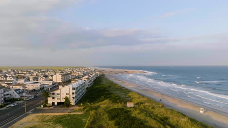 aerial view tilting over the brigantine beach, golden hour in new jersey, usa