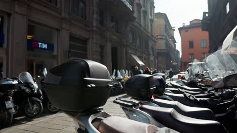 motor scooters parked on a city street