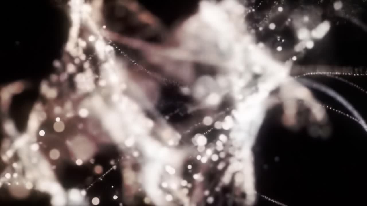 A mesmerizing visual exploration of intricate patterns and dynamic movements, revealing the beauty and complexity of abstract forms through a series of glowing particles and lines