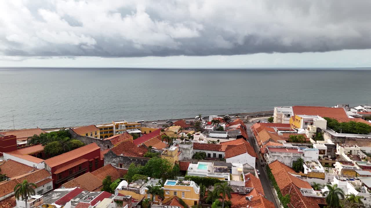 Aerial View of Cartagena Colombia Old Town Buildings, Coastal Traffic and Caribbean Sea on Cloudy Day