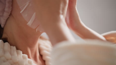 woman applying face mask for skincare routine