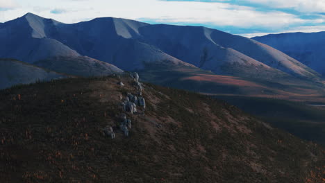 churchward hill and ogilvie mountain range in autumn colors from the dempster highway in yukon, canada. aerial shot