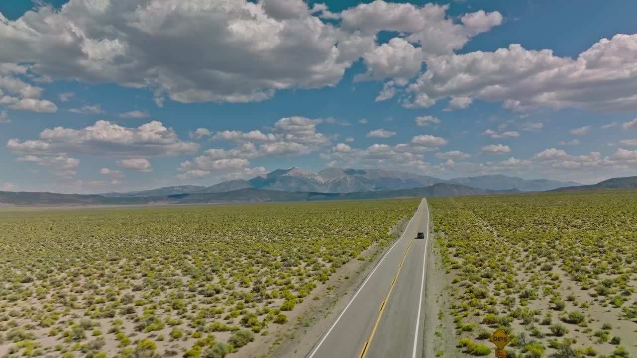 Car driving along road on American road trip with beautiful smooth