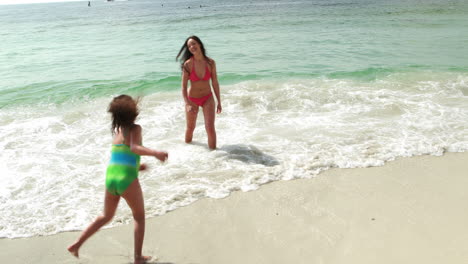 Mother-and-daughter-playing-in-water