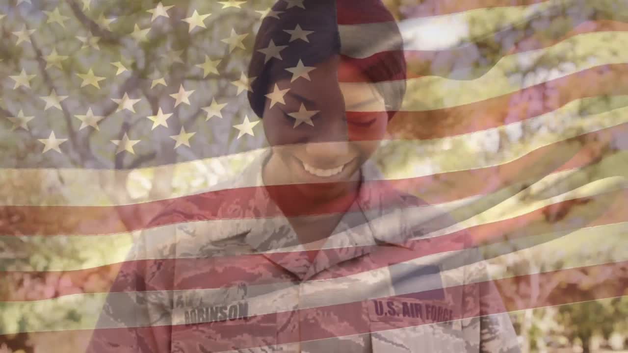 soldado estadounidense sosteniendo a sus hijas