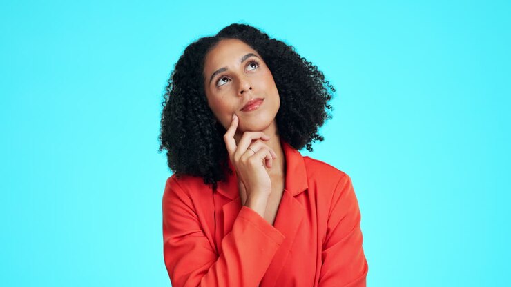 Thinking, looking up and woman in studio