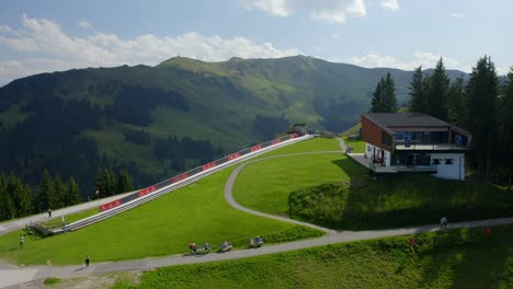 an awe-inspiring view of the hahnenkamm mountain, showcasing rugged alpine slopes and an iconic winter sports legacy.