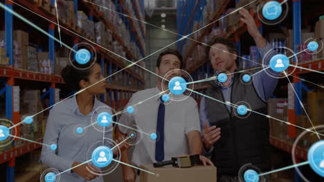 Discussing-logistics,-warehouse-workers-with-network-connections-and-data-processing-animation