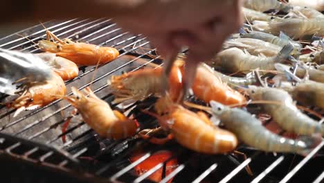 asian street vendor selling grilled seafood