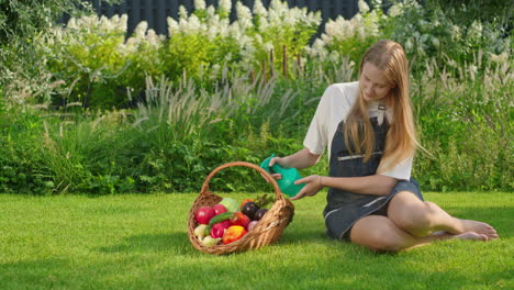 young woman harvesting vegetables in garden