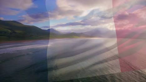 Digital-composition-of-france-flag-waving-against-man-with-surfboard-walking-on-the-beach