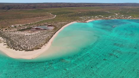aerial views of a tropical coastline with turquoise water