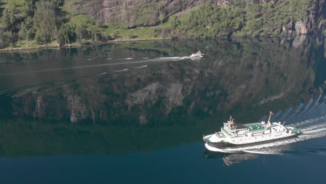 The-ferry-sails-slowly-through-a-quiet-Norwegian-fjord