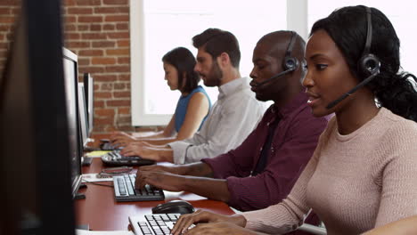 Staff-At-Desks-In-Customer-Service-Department-Shot-On-R3D