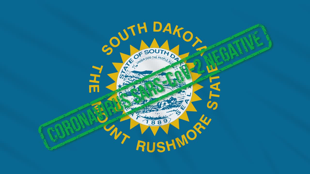 미국 사우스 다코타 주 (south dakota) 의 발은 코로나 바이러스로부터의 자유의 녹색 스프로 흔들리고 있습니다.