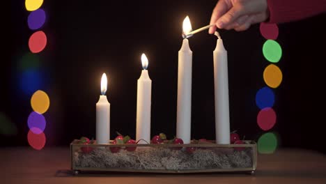 Lighting the third advent candle