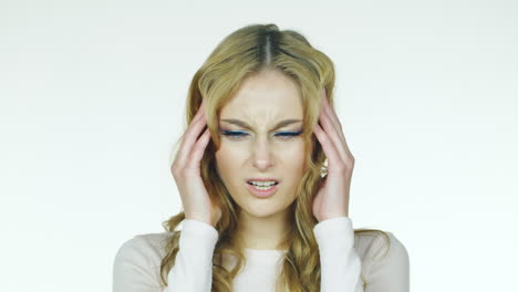 studio video on a white background the woman has a headache the pain goes away she smiles