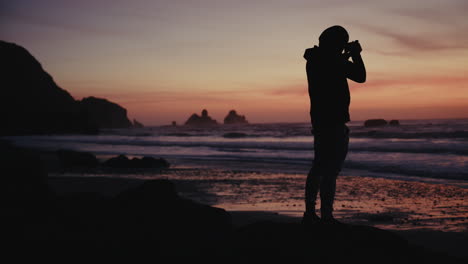 photographer at sunset beach
