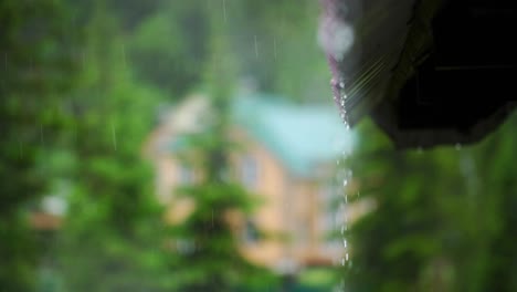 rain falling from a gutter on a rainy day
