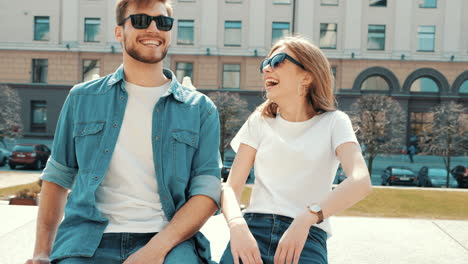 happy couple laughing outdoors