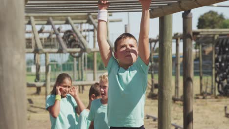 Caucasian-boy-training-at-boot-camp-