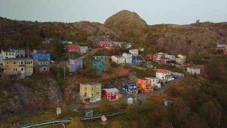 brightly colored homes built into the side of a hill in st