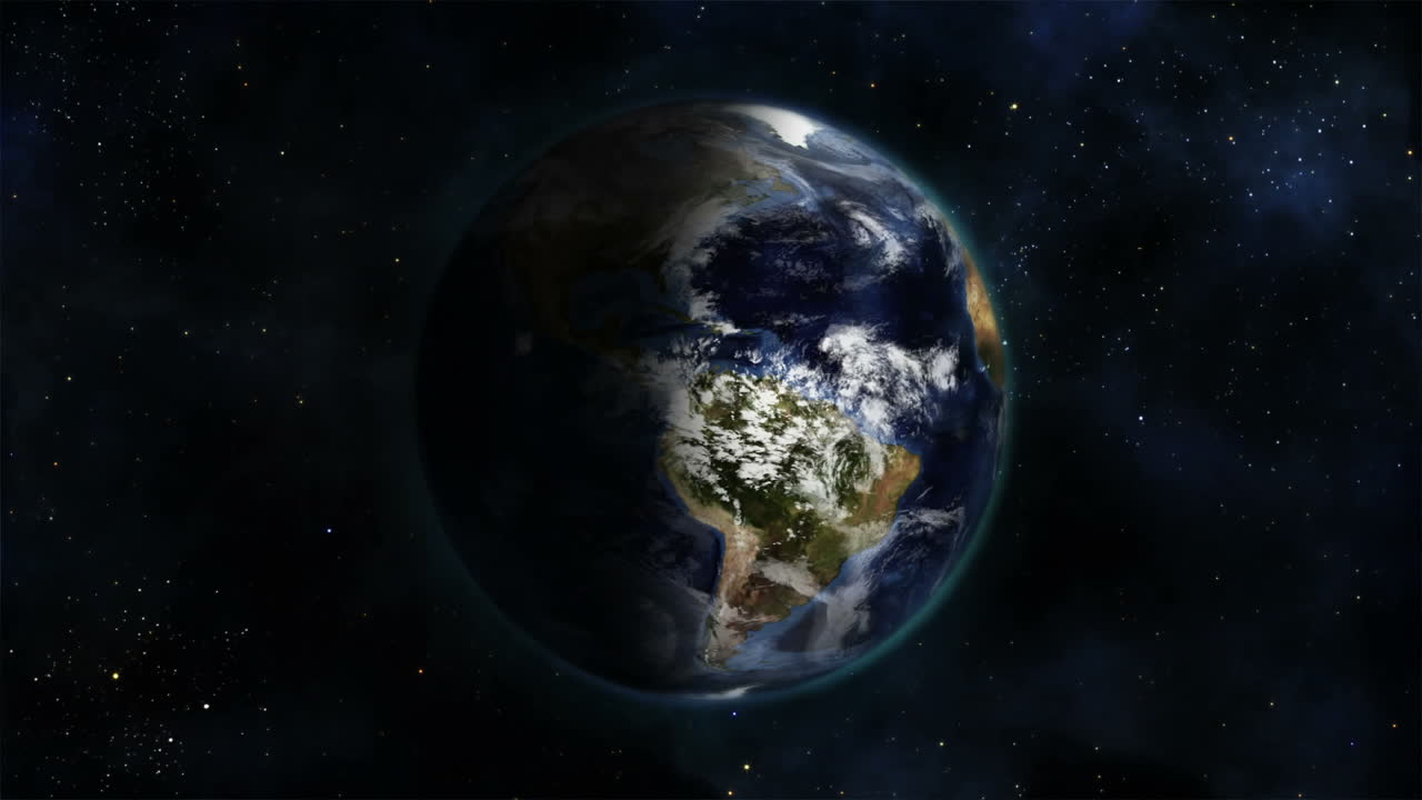 Shaded and cloudy Earth turning on itself with Earth image curtesy of Nasa.org