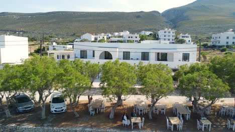 aerial view of a white mansion in diakofti village on a sunny summer day