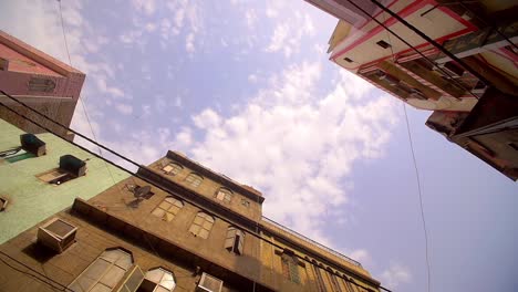 panning around building tops on indian street