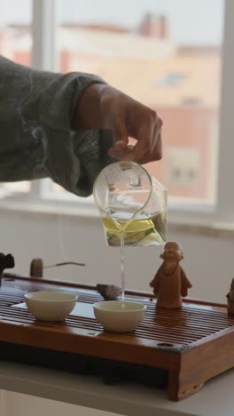 tea ceremony with monk statue