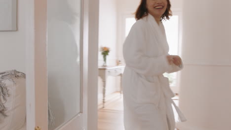 happy little asian boy playing catch with mother running through house enjoying fun weekend morning with child 4k footage