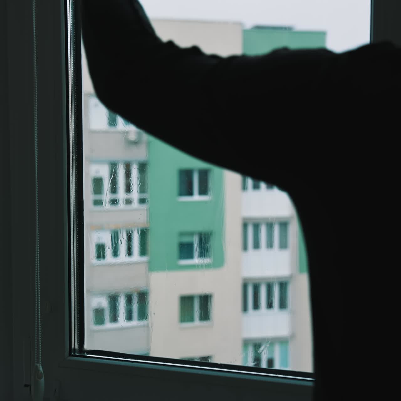 Glass cleaning professioanl worker. Window cleaning indoor interior