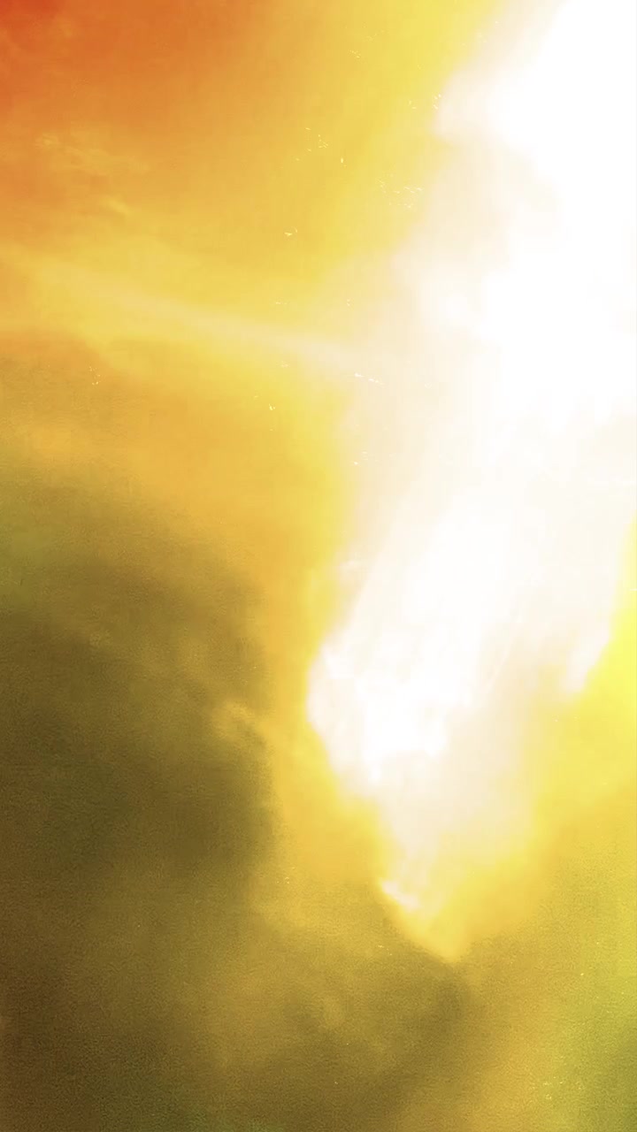 Abstract Light Leaks and Glowing Particles on Dark Background