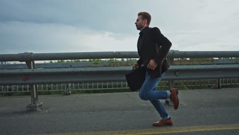businessman running on a bridge