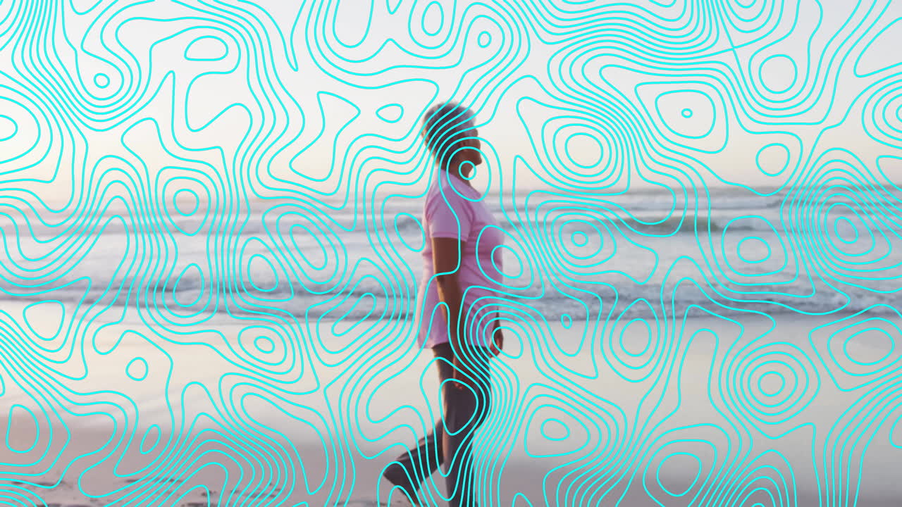 Walking on beach, person with animation of abstract blue line patterns overlay