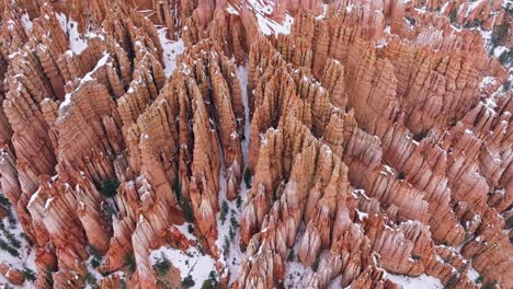 winter landscape of bryce canyon national park, united states - aerial drone shot