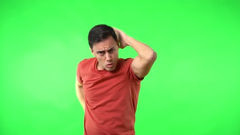 man expressing emotions and gesturing on green screen