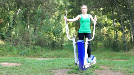 Woman-exercising-on-a-trainer