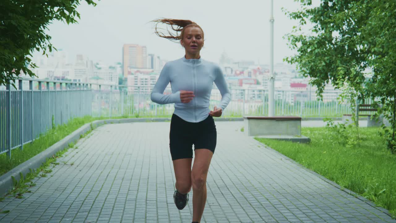 Woman Running in Park