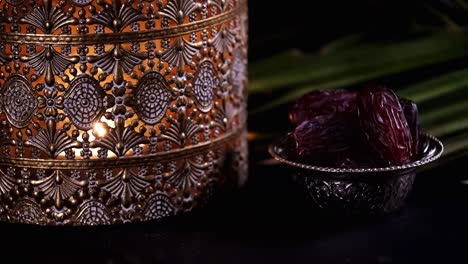 ramadan concept, date fruit and lantern.