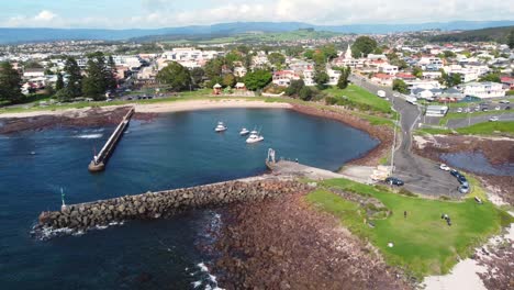 drone aerial pan shot of shellharbour boat ramp scenic tourism south coast nsw australia 4k