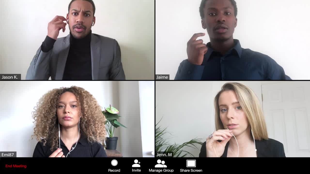 Two People Having Technical Problems On An Online Conference Call