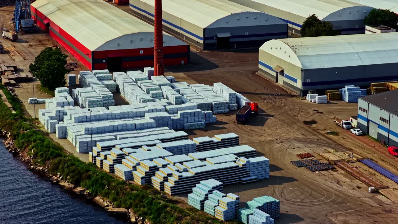 Container terminal Port of Riga freight train transport storage bulk material warehouse, aerial Latvia