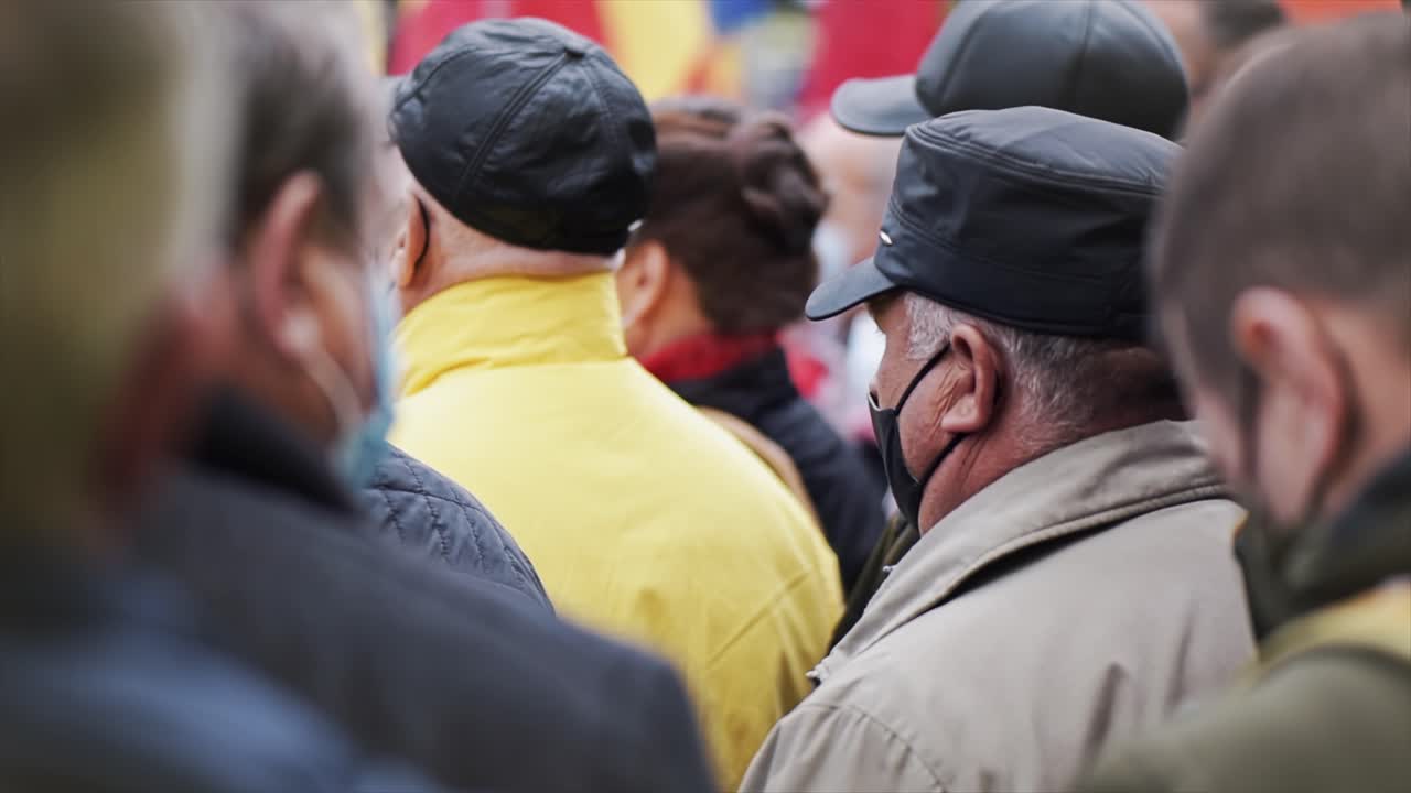 People protesting for snap elections in front of constitutional court building, Chisinau, Moldova. Slow motion