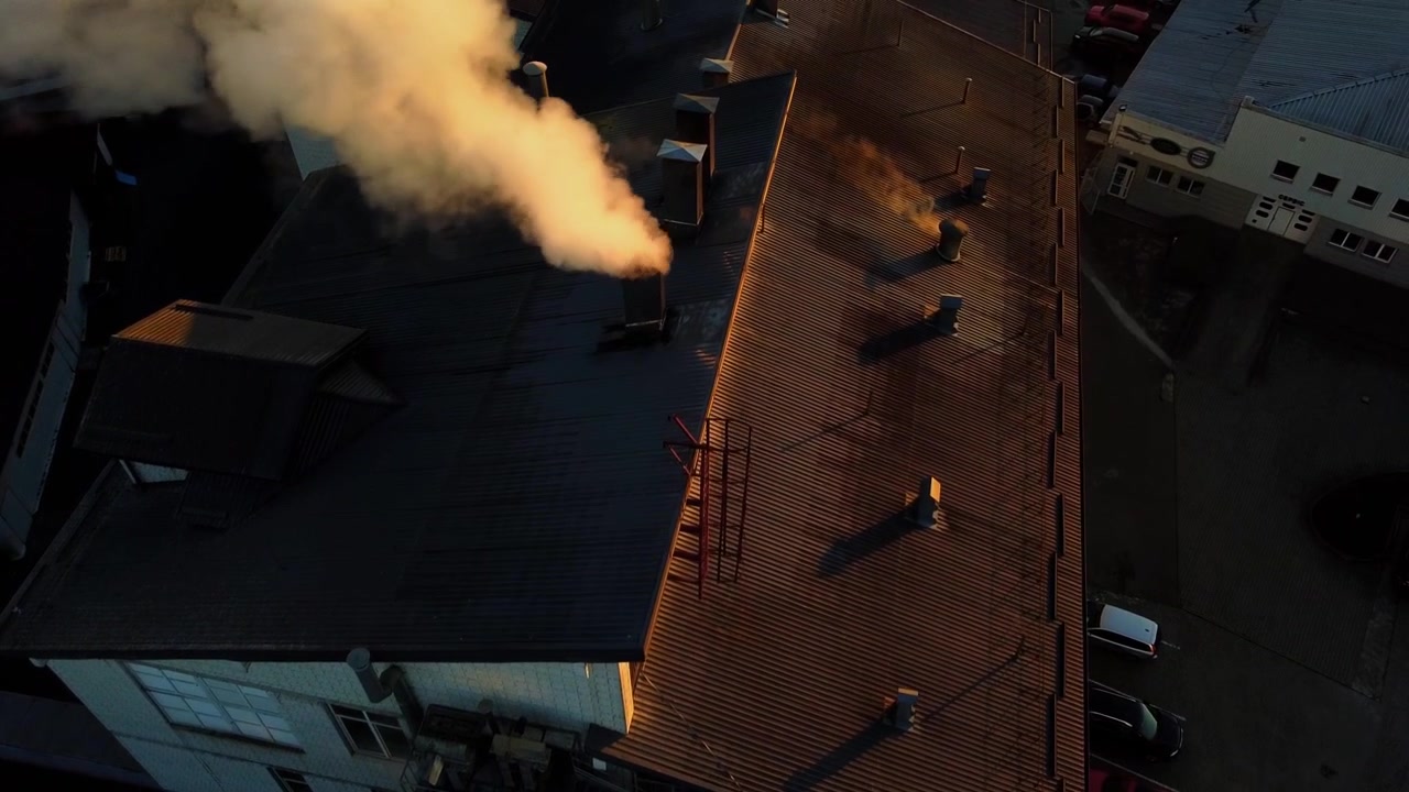 Aerial view of a drone flying over the beer production plant.