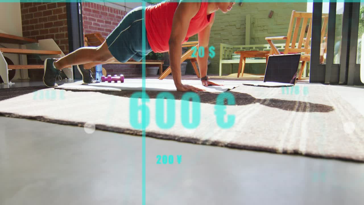 Man following laptop, doing pushups for fitness on rug, animated charts growing across lower third