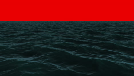 Choppy-blue-ocean-under-red-screen-sky-